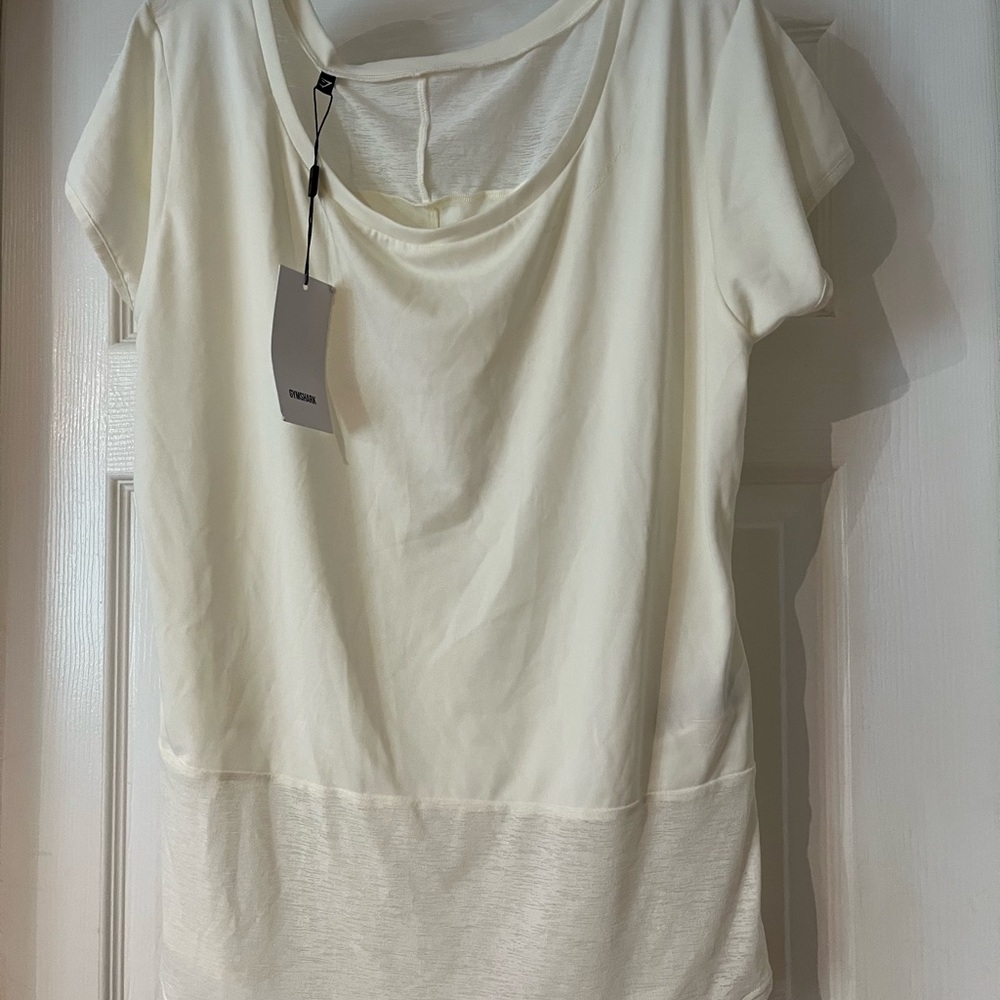 Elegant Cream Women's Top by Gymshark.